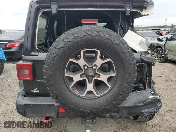 2019 Jeep Wrangler Unlimited Rubicon with VIN 1C4HJXFN6KW665805, listed as a Copart auction lot 45424005 with 141,007 mi miles and Salvage title. Bid and sale history available at DreamBid. Image 6.