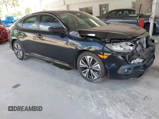 2017 Honda Civic EX-L z VIN 19XFC1F76HE028822, wystawiony jako IAAI lot #42299520 z przebiegiem 52 757 mil mil oraz . Historia ofert i sprzedaży dostępna na DreamBid. Obrazek 1.