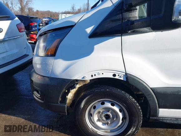 2020 Ford Transit Cargo with VIN 1FTBW3X82LKA91396, listed as a IAAI auction lot 41310803 with 60,760 mi miles and . Bid and sale history available at DreamBid. Image 18.