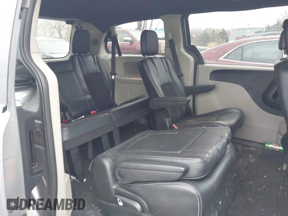 2019 Dodge Grand Caravan SXT with VIN 2C4RDGCG1KR580039, listed as a IAAI auction lot 41997472 with 163,915 mi miles and . Bid and sale history available at DreamBid. Image 8.