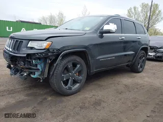 2014 Jeep Grand Cherokee Overland with VIN 1C4RJFCG6EC121654, listed as a IAAI auction lot 42051730 with 163,853 mi miles. Bid and sale history available at carsss.com. Image 19.