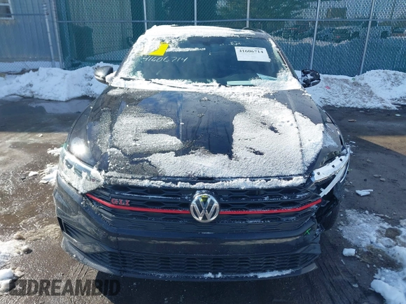 2019 Volkswagen Jetta GLI S z VIN 3VW6T7BU5KM240619, wystawiony jako IAAI lot #41606714 z przebiegiem 86 557 mil mil oraz . Historia ofert i sprzedaży dostępna na DreamBid. Obrazek 12.