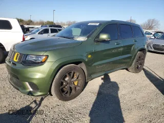 2021 Jeep Grand Cherokee Trackhawk with VIN 1C4RJFN91MC819067, listed as a Copart auction lot 42975965 with 36,986 mi miles and Clean title. Bid and sale history available at DreamBid. Image 1.