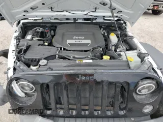 2016 Jeep Wrangler Willys Wheeler z VIN 1C4AJWAG7GL297695, wystawiony jako Copart lot #70838414 z przebiegiem 82 813 mil mil oraz Szkoda całkowita • Salvage title. Historia ofert i sprzedaży dostępna na DreamBid. Obrazek 12.