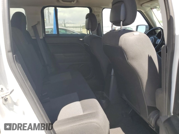 2016 Jeep Patriot High Altitude z VIN 1C4NJRFB8GD709309, wystawiony jako Copart lot #57939705 z przebiegiem 83 818 mil mil oraz Szkoda całkowita • Salvage title. Historia ofert i sprzedaży dostępna na DreamBid. Obrazek 11.