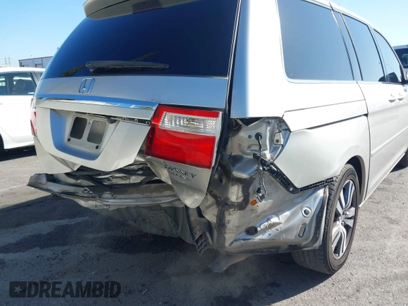 2005 Honda Odyssey TOURING with VIN 5FNRL38865B128519, listed as a IAAI auction lot 41830182 with 171,010 mi miles. Bid and sale history available at carsss.com. Image 18.