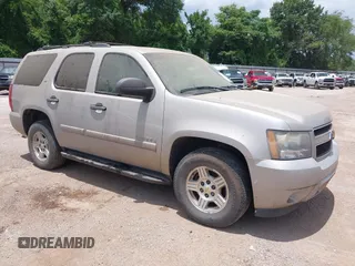 2007 Chevrolet Tahoe LT z VIN 1GNFC130X7R353412, wystawiony jako IAAI lot #42535108 z przebiegiem 78 497 mil mil oraz . Historia ofert i sprzedaży dostępna na DreamBid. Obrazek 1.