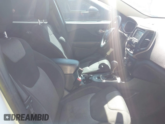 2016 Jeep Cherokee Altitude with VIN 1C4PJLAB2GW212337, listed as a IAAI auction lot 42148601 with 156,012 mi miles and . Bid and sale history available at DreamBid. Image 5.