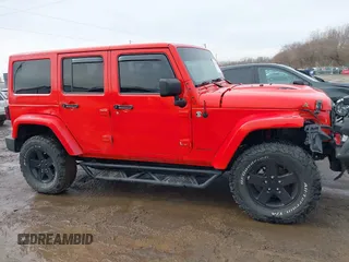 2015 Jeep Wrangler Unlimited Sahara with VIN 1C4BJWEG3FL590491, listed as a IAAI auction lot 41642219 with 148,759 mi miles. Bid and sale history available at carsss.com. Image 12.