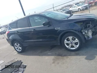 2014 Ford Escape SE with VIN 1FMCU9G91EUA07321, listed as a IAAI auction lot 41807424 with 149,276 mi miles and . Bid and sale history available at DreamBid. Image 14.