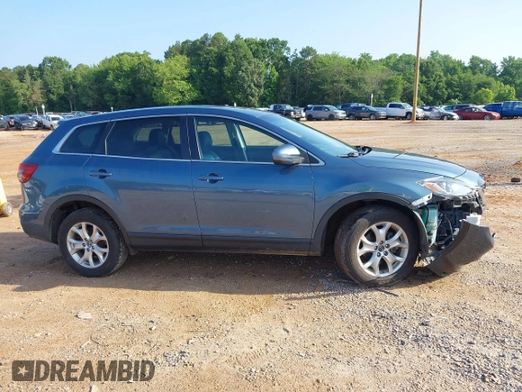 2014 Mazda CX-9 Touring with VIN JM3TB3CV7E0435659, listed as a IAAI auction lot 42428247 with 124,523 mi miles and . Bid and sale history available at DreamBid. Image 13.