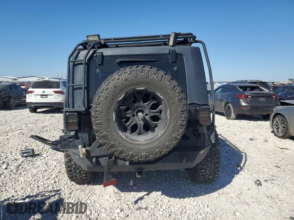 2008 Jeep Wrangler Rubicon with VIN 1J4GA64178L632855, listed as a Copart auction lot 49717905 with 92,031 mi miles and Salvage title. Bid and sale history available at DreamBid. Image 6.