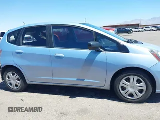 2009 Honda Fit z VIN JHMGE88259S037601, wystawiony jako IAAI lot #42428704 z przebiegiem 55 823 mil mil oraz . Historia ofert i sprzedaży dostępna na DreamBid. Obrazek 14.