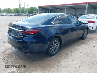 2018 Mazda 6 Sport with VIN JM1GL1UM7J1334658, listed as a IAAI auction lot 41938763 with 129,563 mi miles. Bid and sale history available at carsss.com. Image 4.
