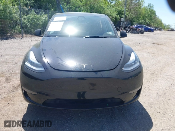 2023 Tesla Model Y Long Range with VIN 7SAYGDEE0PA111430, listed as a IAAI auction lot 42156924 with 35,950 mi miles and . Bid and sale history available at DreamBid. Image 13.