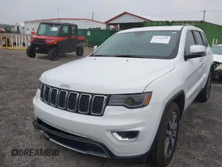 2018 Jeep Grand Cherokee Limited with VIN 1C4RJFBG8JC245999, listed as a IAAI auction lot 42345499 with 90,670 mi miles and . Bid and sale history available at DreamBid. Image 22.
