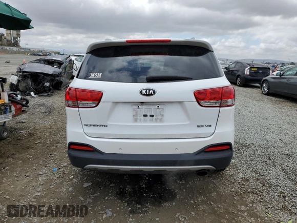 2017 Kia Sorento EX z VIN 5XYPH4A57HG301802, wystawiony jako Copart lot #55183885 z przebiegiem 128 064 mil mil oraz Szkoda całkowita • Salvage title. Historia ofert i sprzedaży dostępna na DreamBid. Obrazek 6.