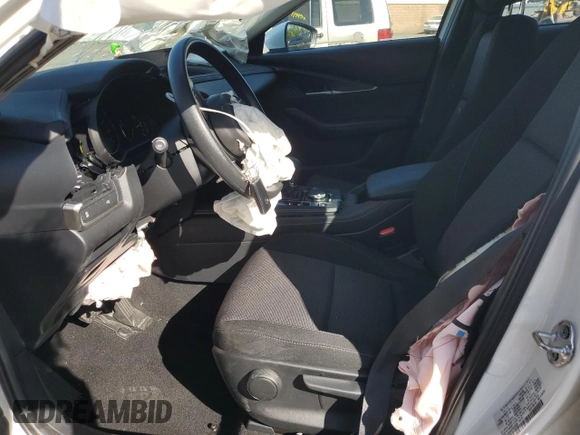 2023 Mazda CX-30 S with VIN 3MVDMBAM0PM506565, listed as a Copart auction lot 57699125 with 7,345 mi miles and Salvage title. Bid and sale history available at DreamBid. Image 7.