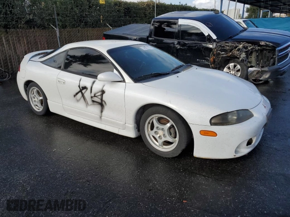 1998 Mitsubishi Eclipse with VIN 4A3AK44YXWE152916, listed as a Copart auction lot 84327974 with 115,415 mi miles and Salvage Title. Bid and sale history available at DreamBid. Image 4.