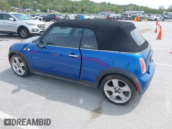 2006 MINI Convertible S with VIN WMWRH335X6TK59110, listed as a IAAI auction lot 42089085 with 101,303 mi miles and . Bid and sale history available at DreamBid. Image 3.