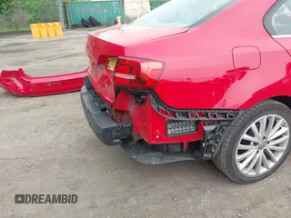 2015 Volkswagen Jetta SE z VIN 3VWD17AJ7FM204019, wystawiony jako IAAI lot #42279830 z przebiegiem 115 901 mil mil oraz . Historia ofert i sprzedaży dostępna na DreamBid. Obrazek 17.