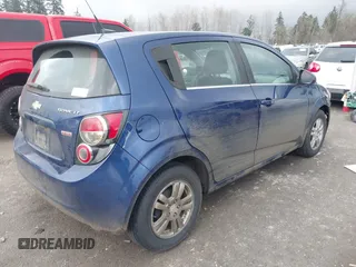 2013 Chevrolet Sonic LT with VIN 1G1JC6SB0D4205841, listed as a IAAI auction lot 41360755 with 137,150 mi miles. Bid and sale history available at carsss.com. Image 4.
