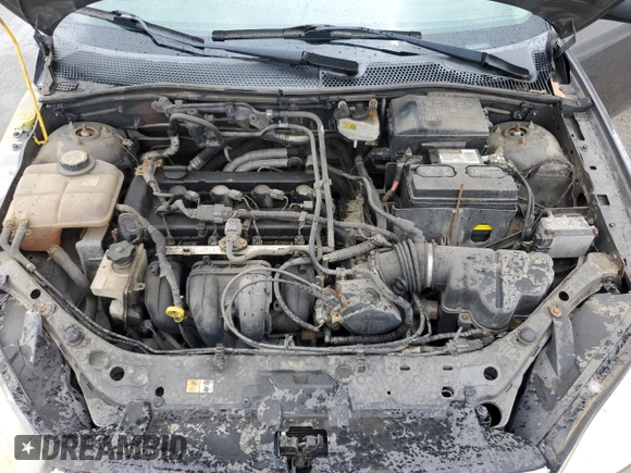 2007 Ford Focus S z VIN 1FAHP34N27W144992, wystawiony jako Copart lot #65571385 z przebiegiem 194 933 mil mil oraz Szkoda całkowita • Salvage title. Historia ofert i sprzedaży dostępna na DreamBid. Obrazek 11.