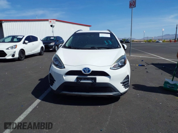 2018 Toyota Prius One with VIN JTDKDTB32J1599890, listed as a IAAI auction lot 42009820 with 57,959 mi miles and . Bid and sale history available at DreamBid. Image 12.
