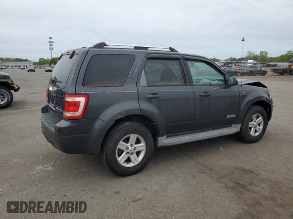 2008 Ford Escape Hybrid с VIN 1FMCU59HX8KE10307, выставлен на аукционе Copart как лот 58074825 с пробегом 165 479 миль миль и Списание • Salvage title. История ставок и продаж доступна на DreamBid. Изображение 3.