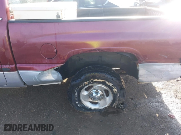 2000 Dodge 1500 z VIN 3B7HF13Z4YM237732, wystawiony jako IAAI lot #41980975 z przebiegiem 159 131 mil mil oraz . Historia ofert i sprzedaży dostępna na DreamBid. Obrazek 6.