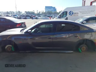 2019 Dodge Charger Scat Pack with VIN 2C3CDXGJ2KH564051, listed as a IAAI auction lot 41255283 with 64,687 mi miles and . Bid and sale history available at DreamBid. Image 14.