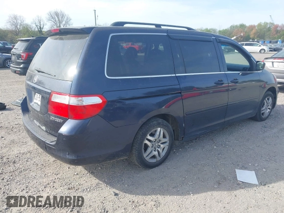 2005 Honda Odyssey EX with VIN 5FNRL38455B135555, listed as a IAAI auction lot 42080079 with 149,468 mi miles and . Bid and sale history available at carsss.com. Image 4.