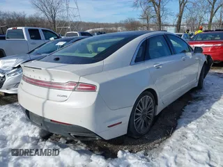 2013 Lincoln MKZ with VIN 3LN6L2J95DR803074, listed as a IAAI auction lot 41331345 with 151,433 mi miles. Bid and sale history available at carsss.com. Image 4.
