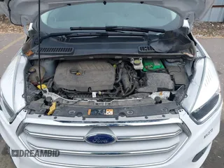 2018 Ford Escape SE z VIN 1FMCU9GD0JUC62783, wystawiony jako IAAI lot #41488153 z przebiegiem 55 774 mil mil oraz . Historia ofert i sprzedaży dostępna na DreamBid. Obrazek 10.