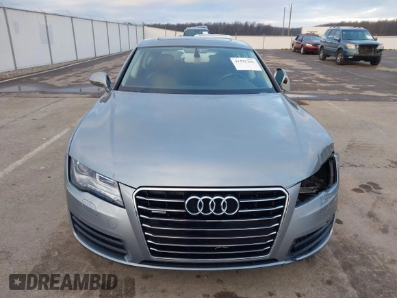 2014 Audi A7 Premium Plus z VIN WAUWGAFC9EN096702, wystawiony jako IAAI lot #41202201 z przebiegiem 103 893 mil mil oraz . Historia ofert i sprzedaży dostępna na DreamBid. Obrazek 12.