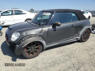 2011 MINI Convertible S z VIN WMWZP3C59BT249133, wystawiony jako Copart lot #56402615 z przebiegiem 103 809 mil mil oraz Szkoda całkowita • Salvage title. Historia ofert i sprzedaży dostępna na DreamBid. Obrazek 1.
