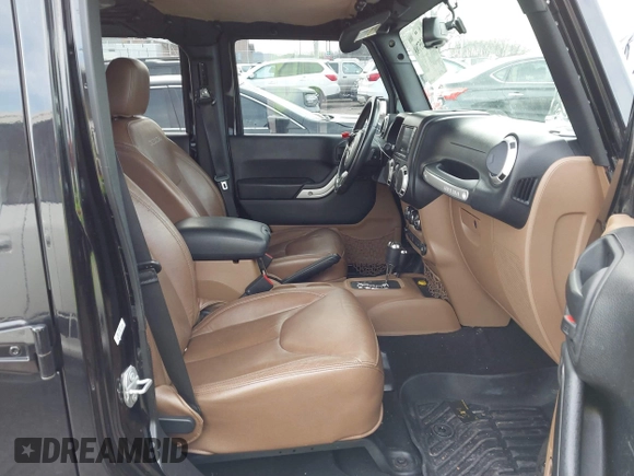 2016 Jeep Wrangler Unlimited 75th Anniversary with VIN 1C4BJWEG1GL221873, listed as a IAAI auction lot 41635788 with 148,493 mi miles. Bid and sale history available at carsss.com. Image 5.
