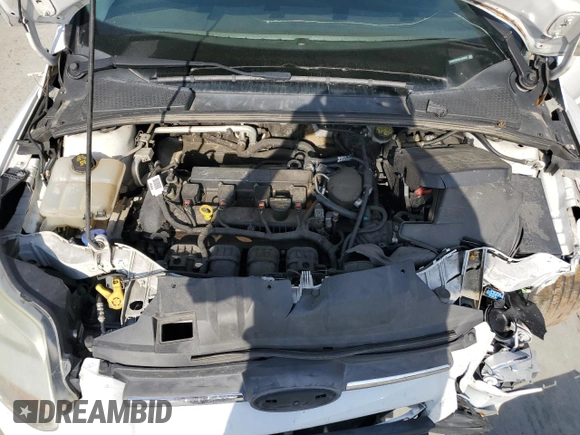 2014 Ford Focus SE z VIN 1FADP3K24EL345833, wystawiony jako Copart lot #57307075 z przebiegiem 158 787 mil mil oraz Szkoda całkowita • Salvage title. Historia ofert i sprzedaży dostępna na DreamBid. Obrazek 11.