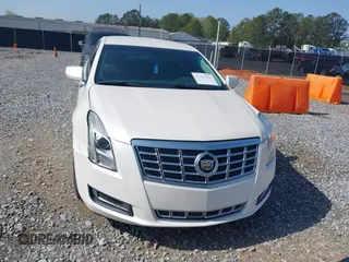 2014 Cadillac XTS with VIN 2G61L5S3XE9231858, listed as a IAAI auction lot 41941564 with 158,479 mi miles. Bid and sale history available at carsss.com. Image 12.