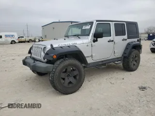 2009 Jeep Wrangler Unlimited Rubicon with VIN 1J8GA69169L731787, listed as a Copart auction lot 44604125 with 180,861 mi miles and Salvage title. Bid and sale history available at DreamBid. Image 1.