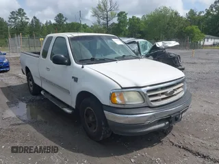 2003 Ford F-150 XL with VIN 1FTRX17L93NB61902, listed as a IAAI auction lot 42096982 with 318,850 mi miles. Bid and sale history available at carsss.com. Image 1.