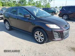 2011 Mazda CX-7 S Touring z VIN JM3ER4CLXB0358063, wystawiony jako IAAI lot #42325445 z przebiegiem 156 206 mil mil oraz . Historia ofert i sprzedaży dostępna na DreamBid. Obrazek 1.