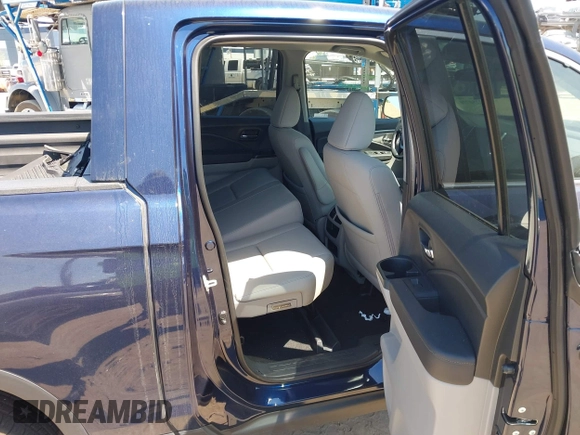 2020 Honda Ridgeline RTL with VIN 5FPYK3F56LB028917, listed as a IAAI auction lot 42280770 with 17,598 mi miles and . Bid and sale history available at DreamBid. Image 8.