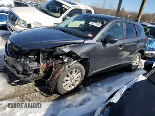 2014 Mazda CX-5 Touring with VIN JM3KE4CY8E0335573, listed as a Copart auction lot 46471085 with 80,041 mi miles and Salvage Title. Bid and sale history available at carsss.com. Image 1.