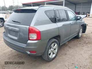 2012 Jeep Compass Sport with VIN 1C4NJCBB7CD664599, listed as a IAAI auction lot 41180829 with 144,909 mi miles. Bid and sale history available at carsss.com. Image 4.
