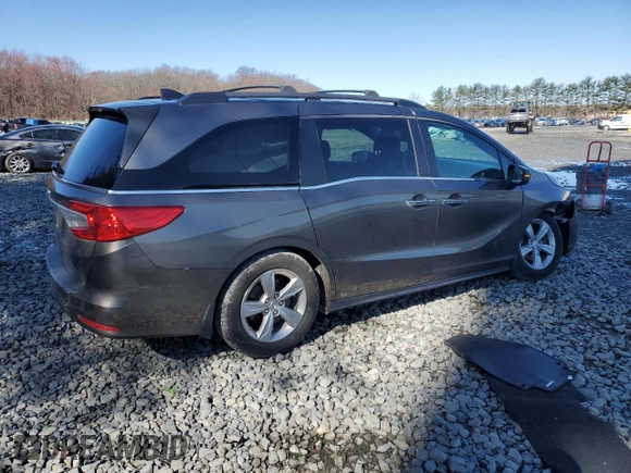 2018 Honda Odyssey EX-L with VIN 5FNRL6H75JB044985, listed as a Copart auction lot 50081345 with 157,688 mi miles and Salvage Title. Bid and sale history available at DreamBid. Image 3.