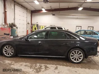 2013 Audi A8 L 3.0L with VIN WAURGAFD4DN002603, listed as a IAAI auction lot 41474881 with 117,220 mi miles. Bid and sale history available at carsss.com. Image 14.