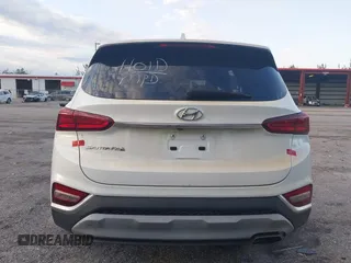 2019 Hyundai Santa Fe SEL with VIN 5NMS33AD0KH006550, listed as a IAAI auction lot 41894306 with 80,920 mi miles and . Bid and sale history available at DreamBid. Image 17.