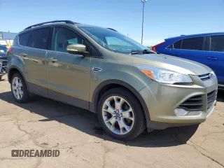 2013 Ford Escape SEL z VIN 1FMCU9H93DUD67848, wystawiony jako Copart lot #57221755 z przebiegiem 129 671 mil mil oraz Czysty tytuł • Clean title. Historia ofert i sprzedaży dostępna na DreamBid. Obrazek 4.