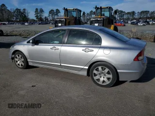 2010 Honda Civic LX with VIN 2HGFA1F57AH327476, listed as a Copart auction lot 45473805 with 202,052 mi miles and Salvage Title. Bid and sale history available at DreamBid. Image 2.